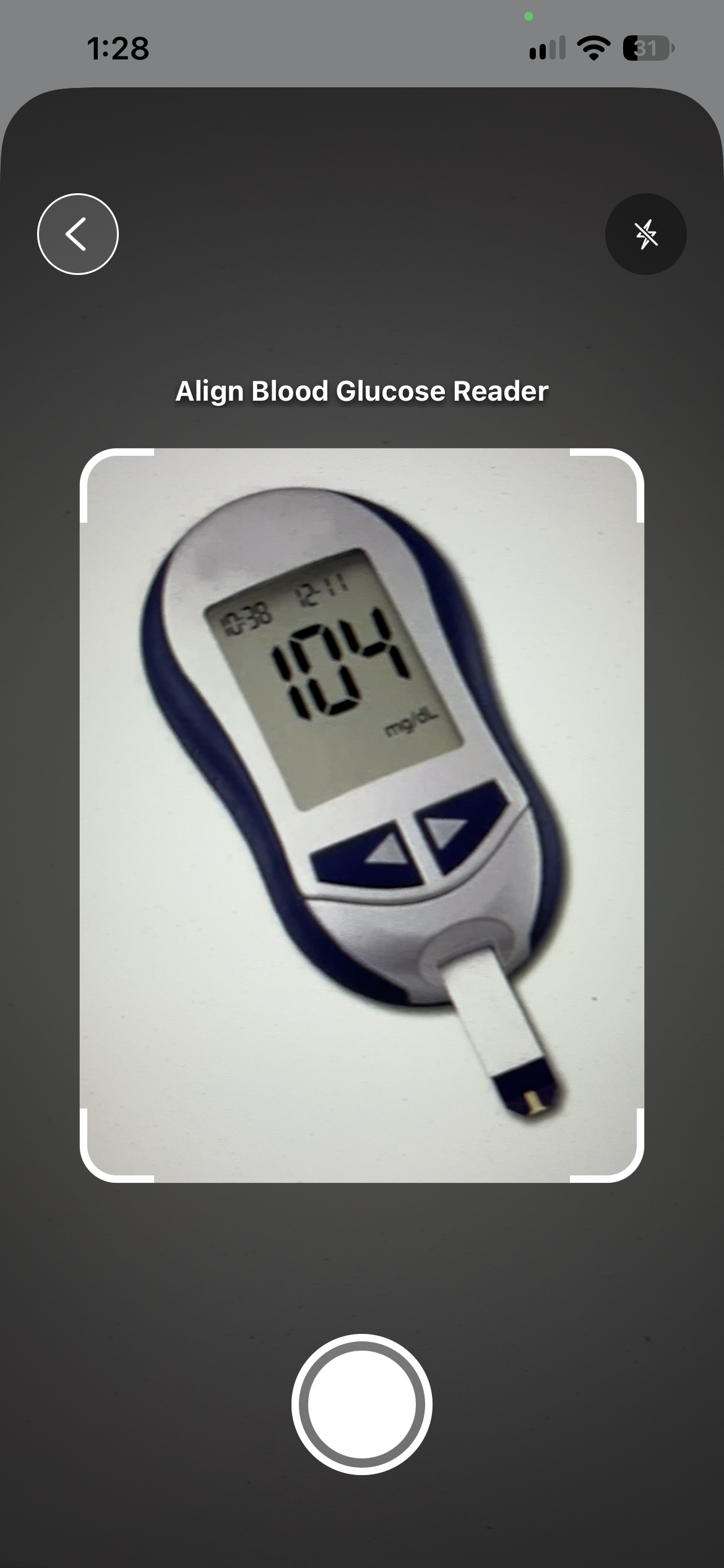Camera view lining a blood glucose meter up inside a guide frame