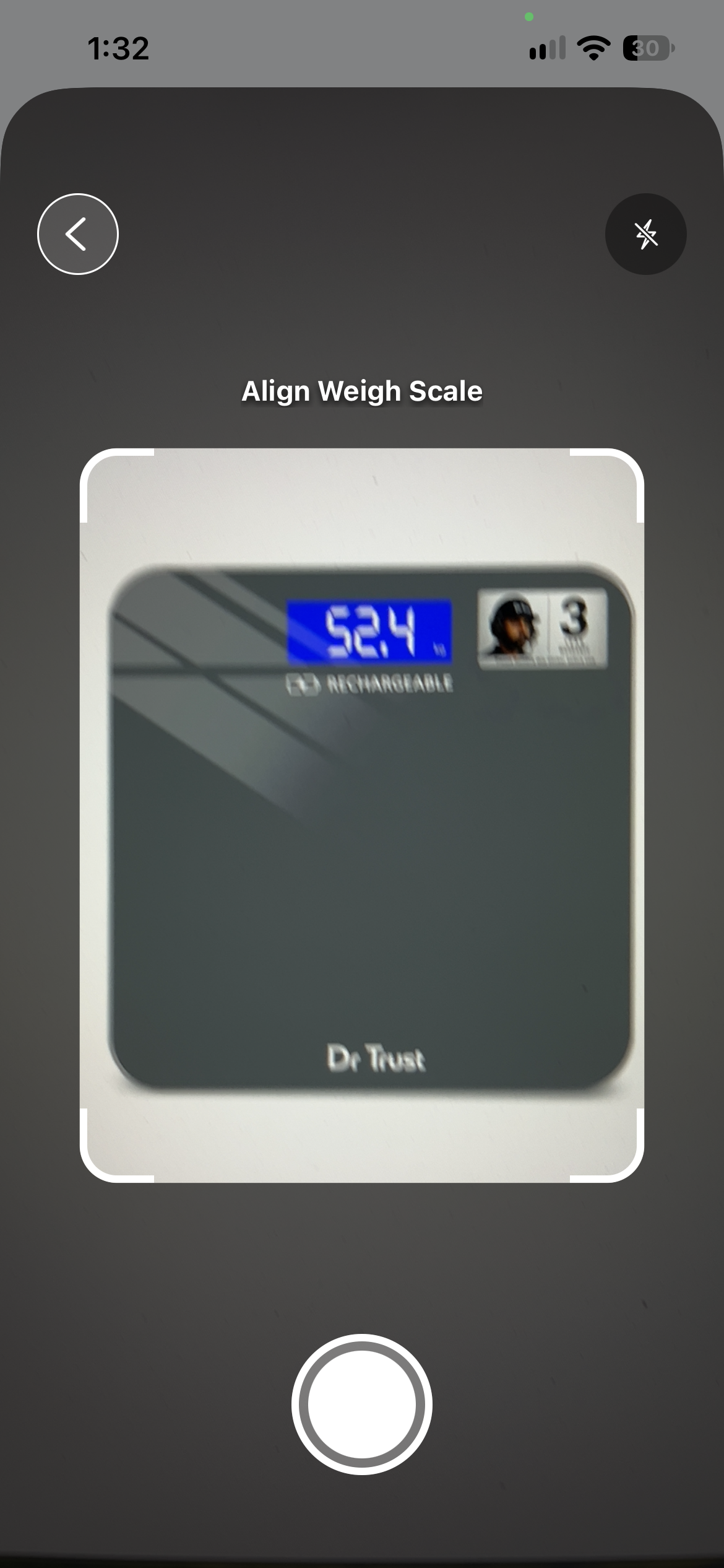 Camera view lining a bathroom scale display up inside a guide frame